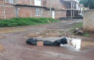 Abandonan un cadáver embolsado en las calles de Tangancícuaro