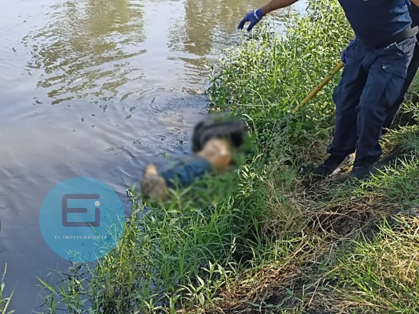 Hallan un cadáver baleado en canal de riego de Zamora