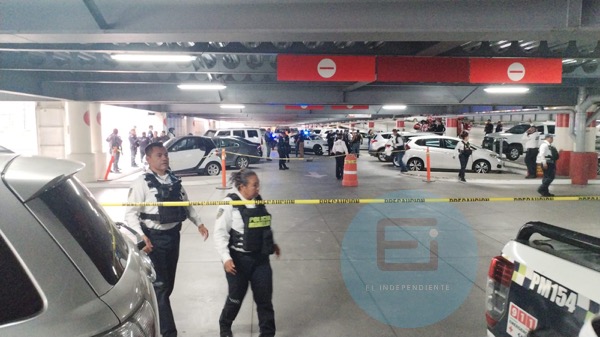 Abogado y escolta, dos de los agraviados, quienes fueron asesinados en el estacionamiento de Plaza Las Américas.